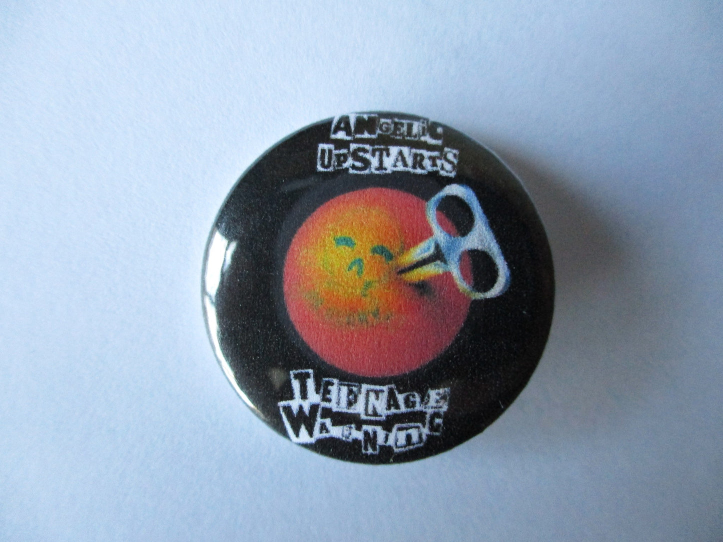 ANGELIC UPSTARTS punk badge (teenage warning)