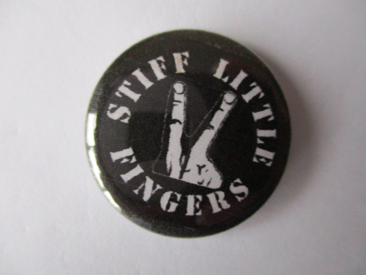 STIFF LITTLE FINGERS punk badge (VARIOUS DESIGNS)