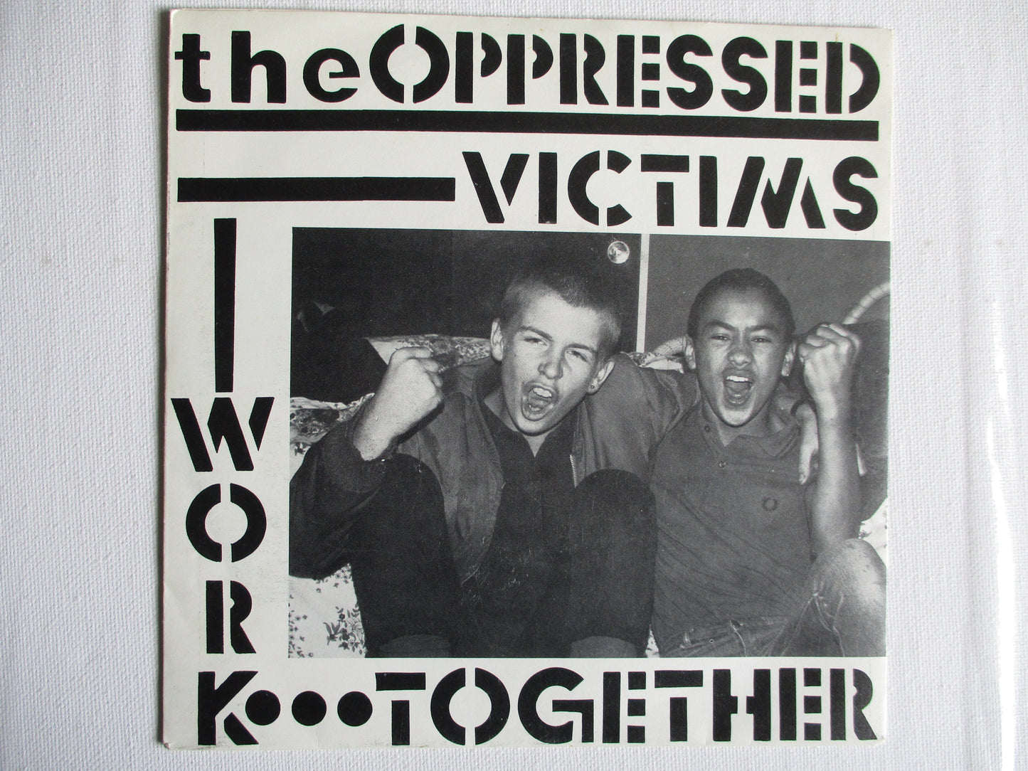 THE OPPRESSED victims/work together 7" EX EX