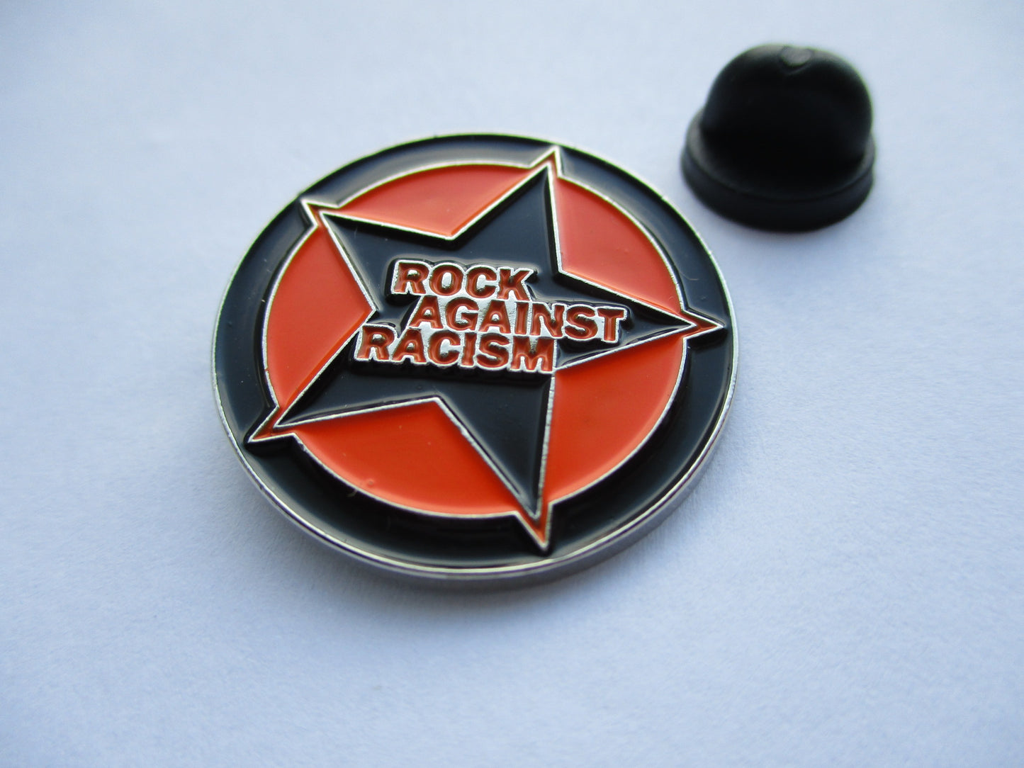 ROCK AGAINST RACISM PUNK METAL BADGE (orange)