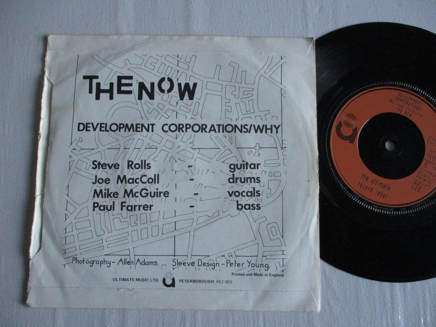 THE NOW development corporations 7" G VG