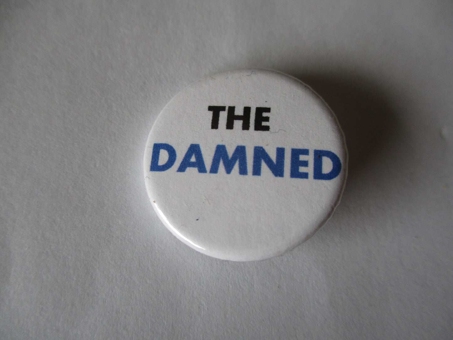THE DAMNED punk badge (blue logo)