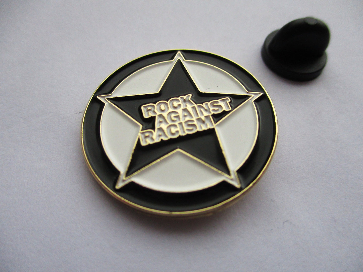 ROCK AGAINST RACISM punk metal badge (gold)