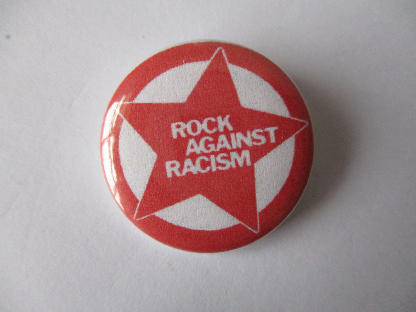 ROCK AGAINST RACISM punk badge (VARIOUS COLOURS)