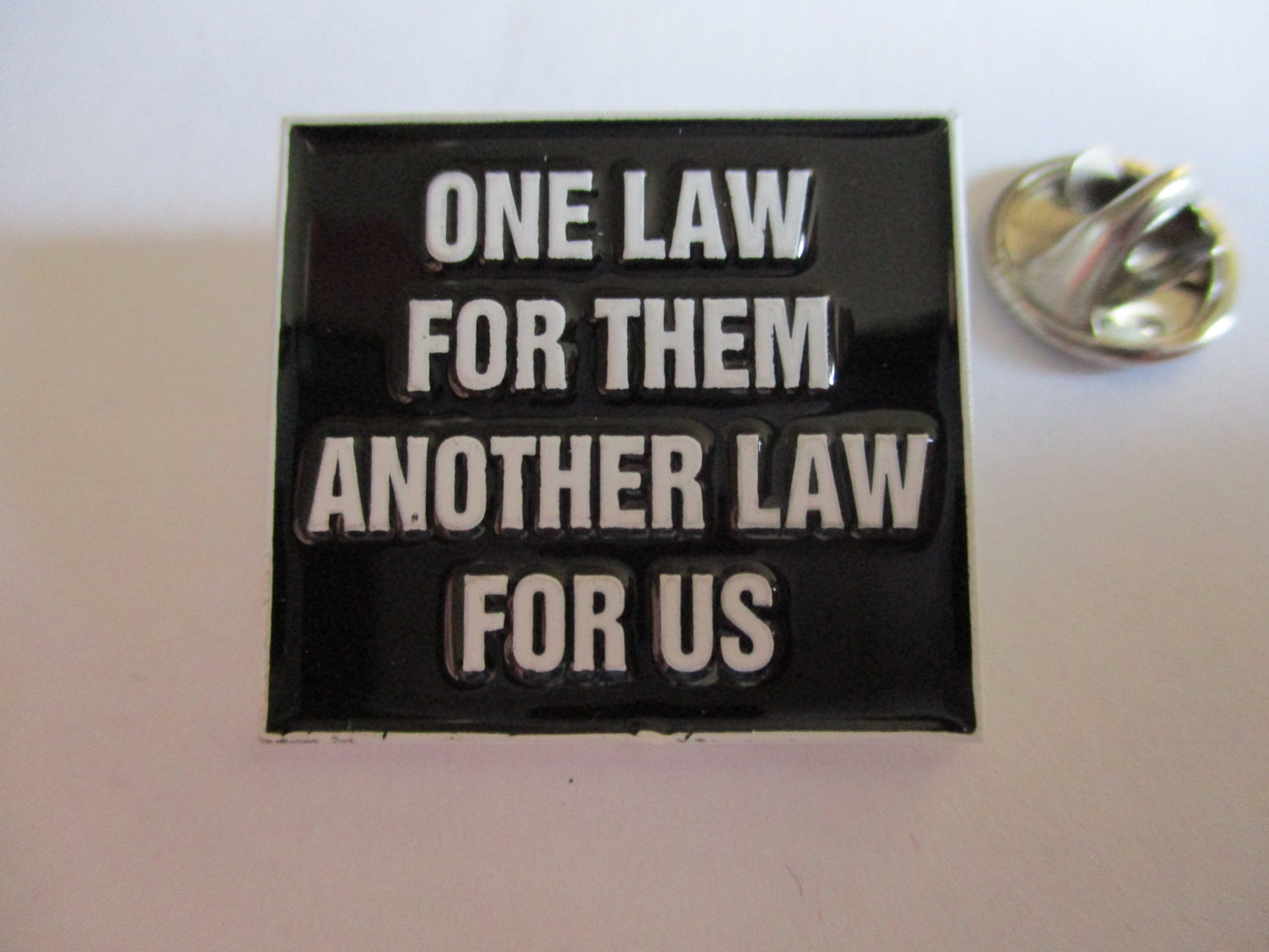 ONE LAW FOR THEM METAL BADGE (b&w)