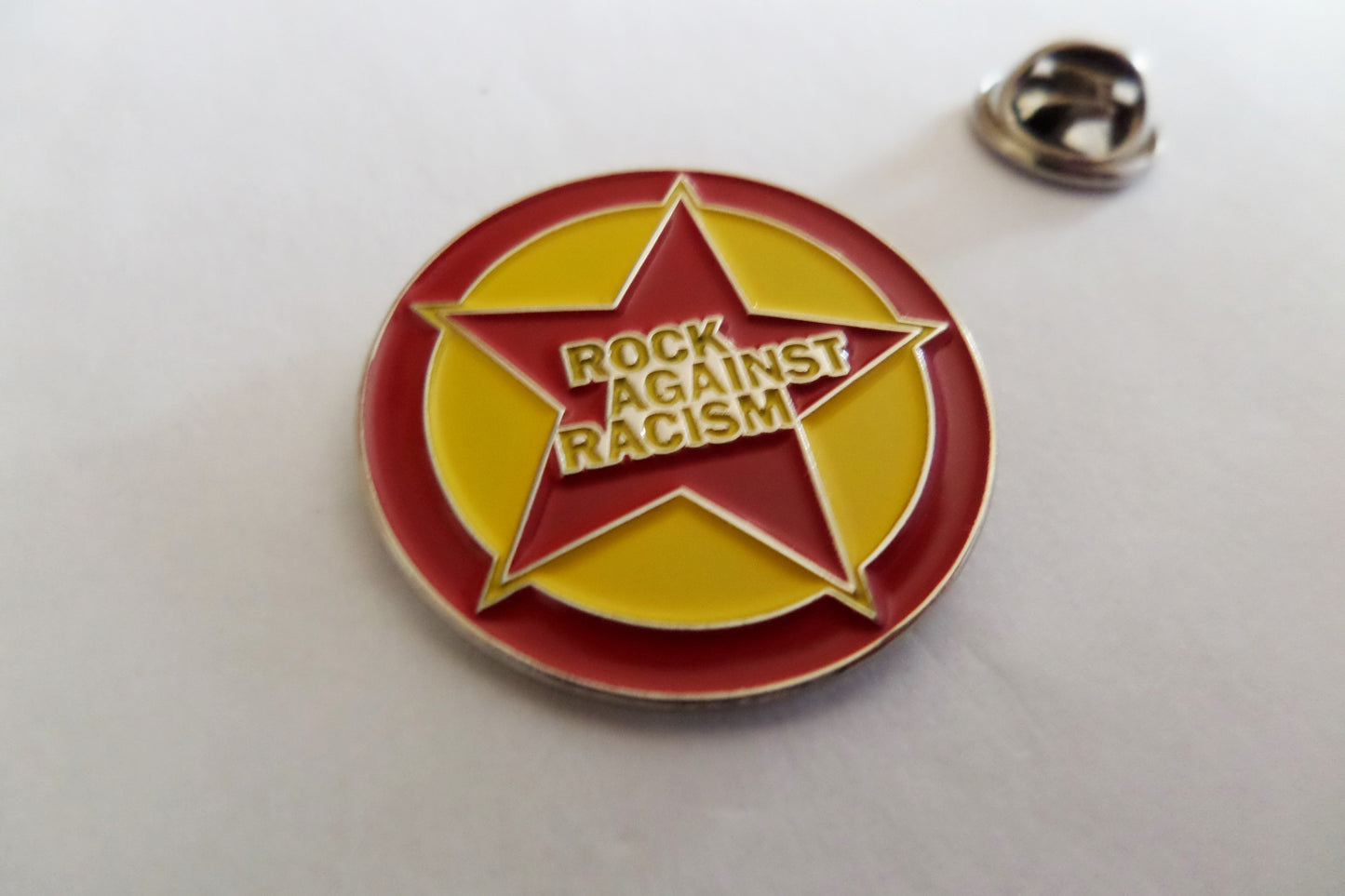 ROCK AGAINST RACISM PUNK METAL BADGE red/yellow