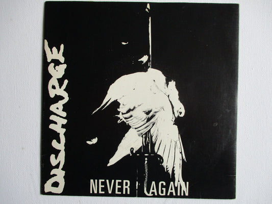 DISCHARGE never again 7" VG+ EX