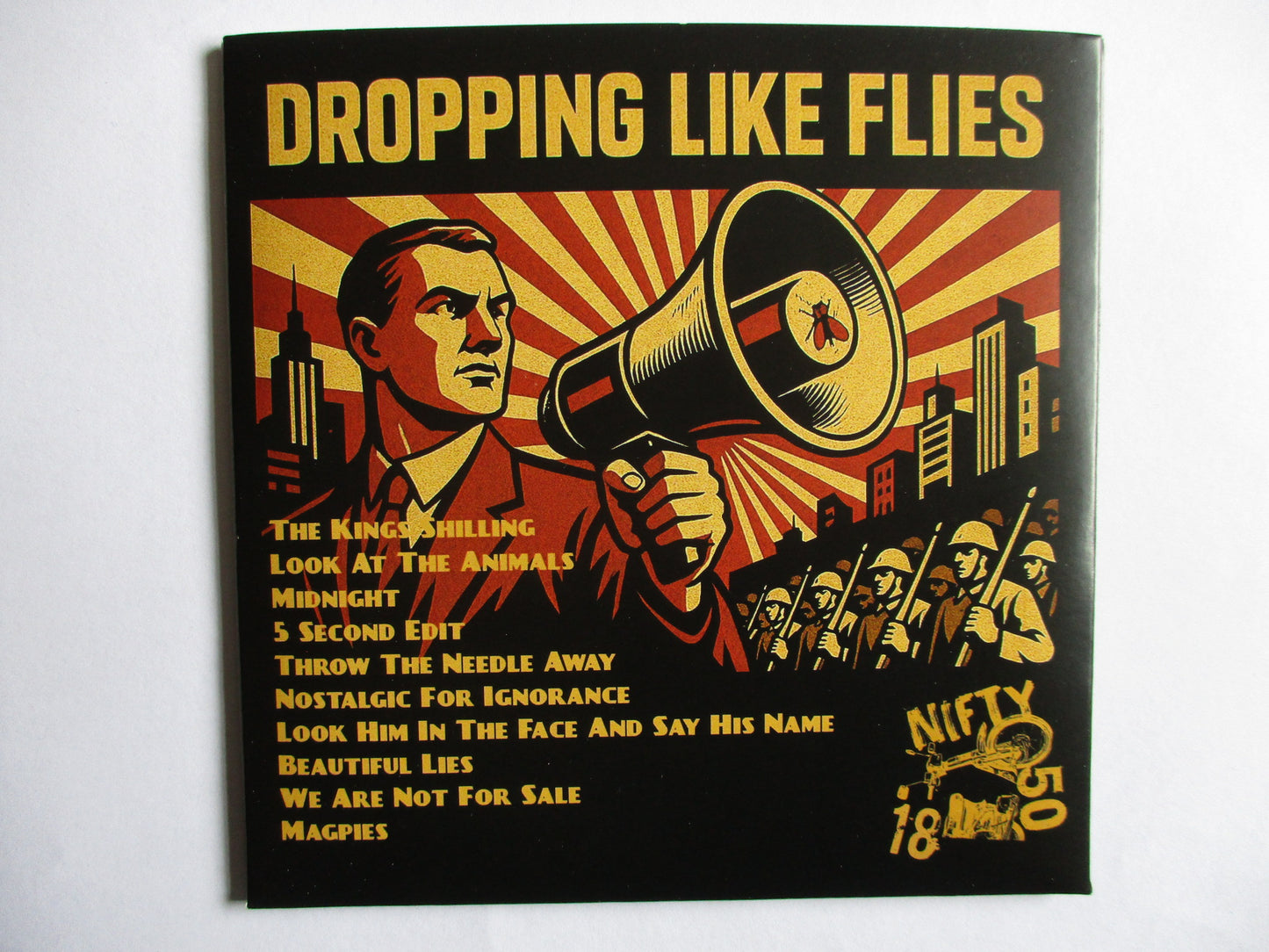 DROPPING LIKE FLIES 5th generation propaganda machine CD