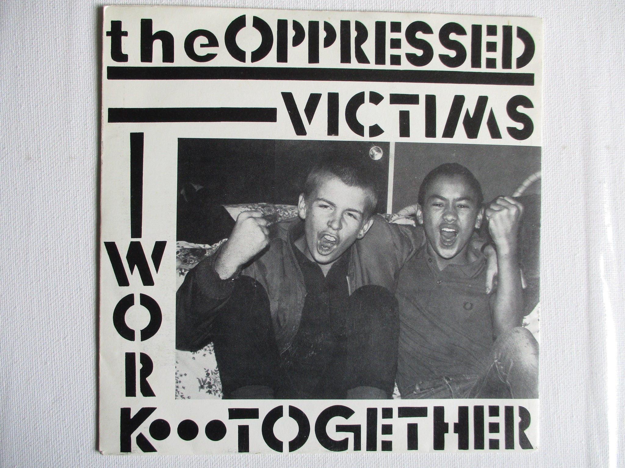 The Oppressed Victims Work Together 7インチ THE OPPRESSED victims/work together 7