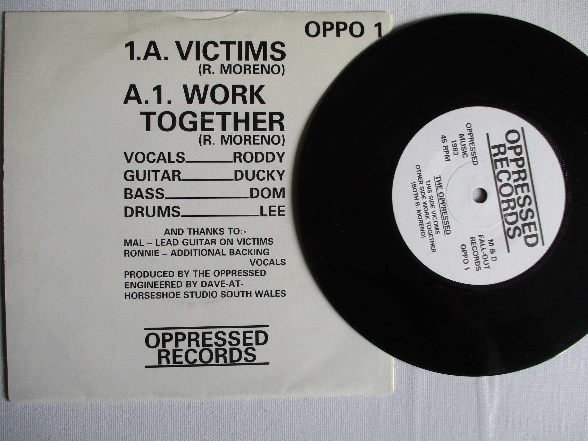 The Oppressed Victims Work Together 7インチ THE OPPRESSED victims/work together 7