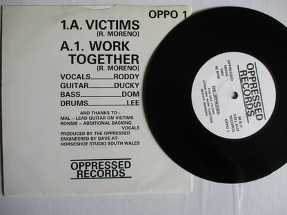 THE OPPRESSED victims/work together 7"  EX EX