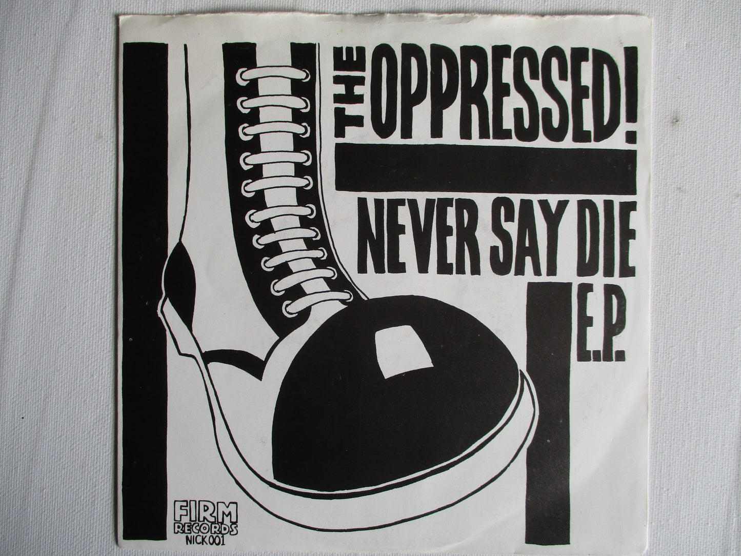 THE OPPRESSED never say die 7" VG+ EX