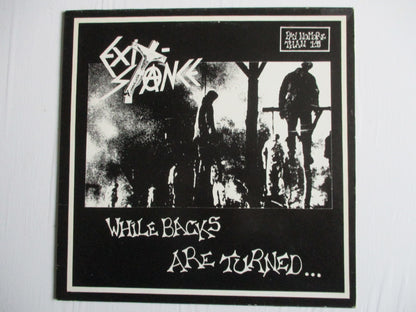 EXITSTANCE while backs are turned 12" VG EX + inner