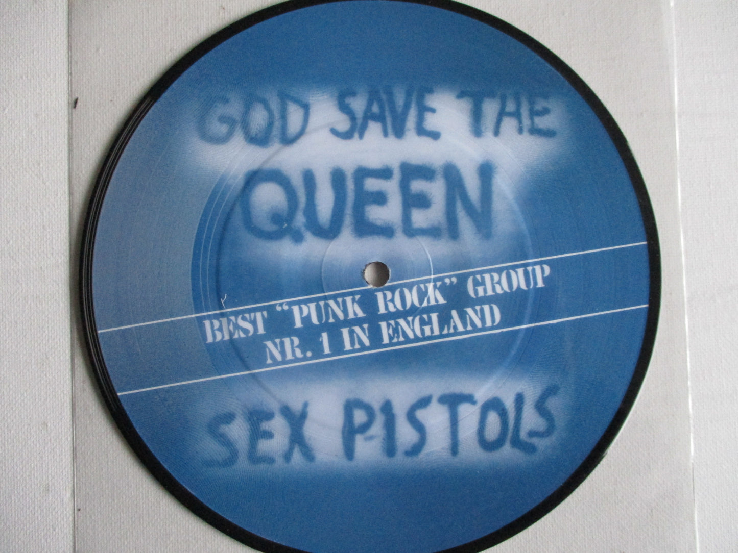 SEX PISTOLS god save the queen 7" Pic Disc Brazil repro EX