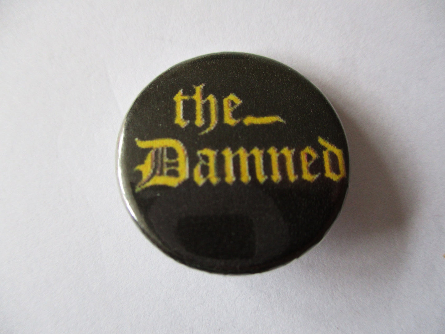 THE DAMNED yellow logo punk badge