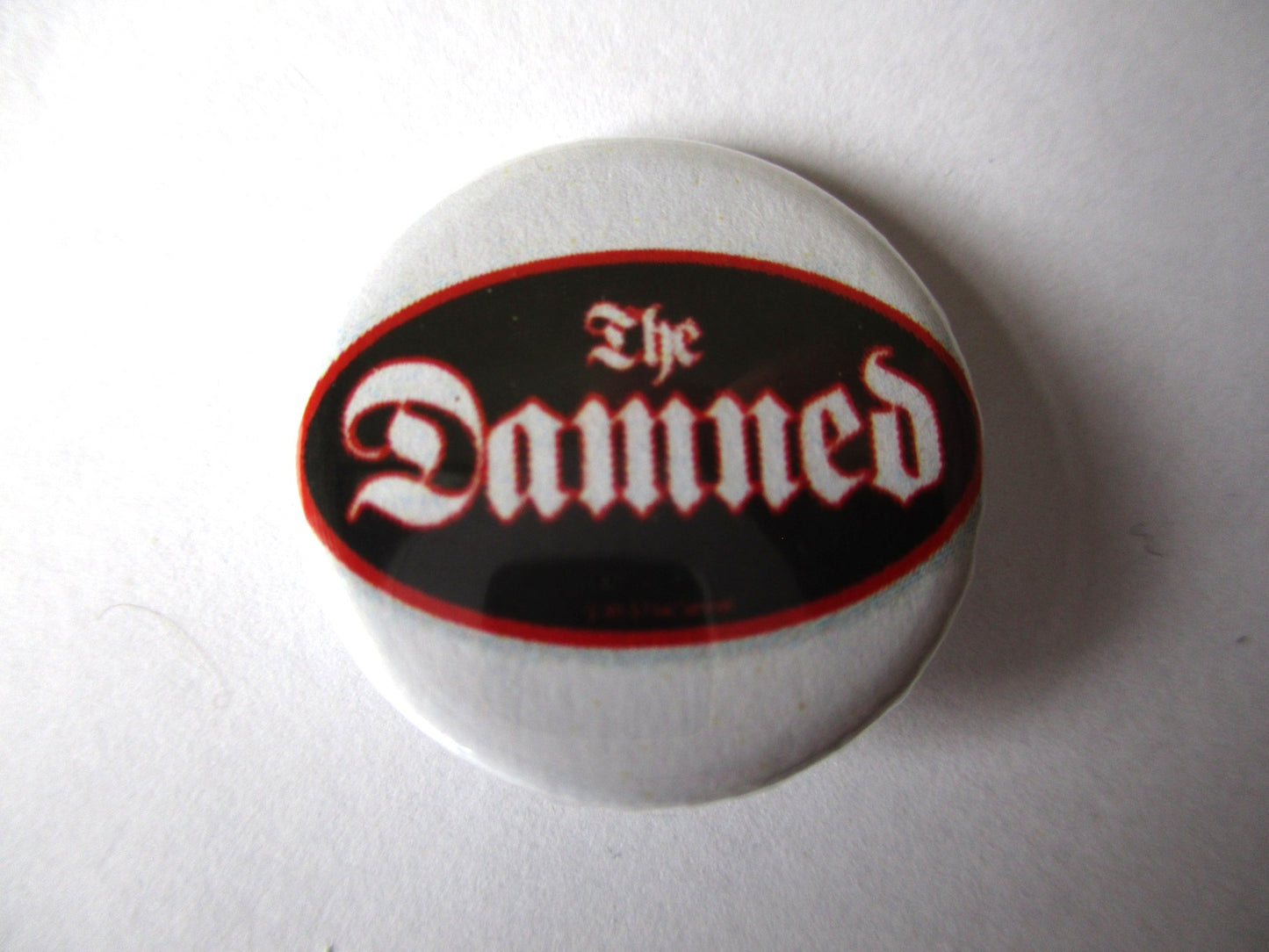 THE DAMNED oval logo punk badge