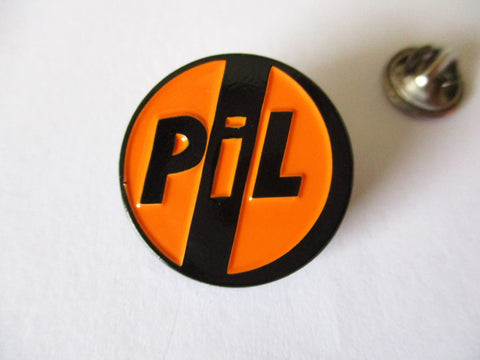 PIL logo POST PUNK METAL BADGE (orange)