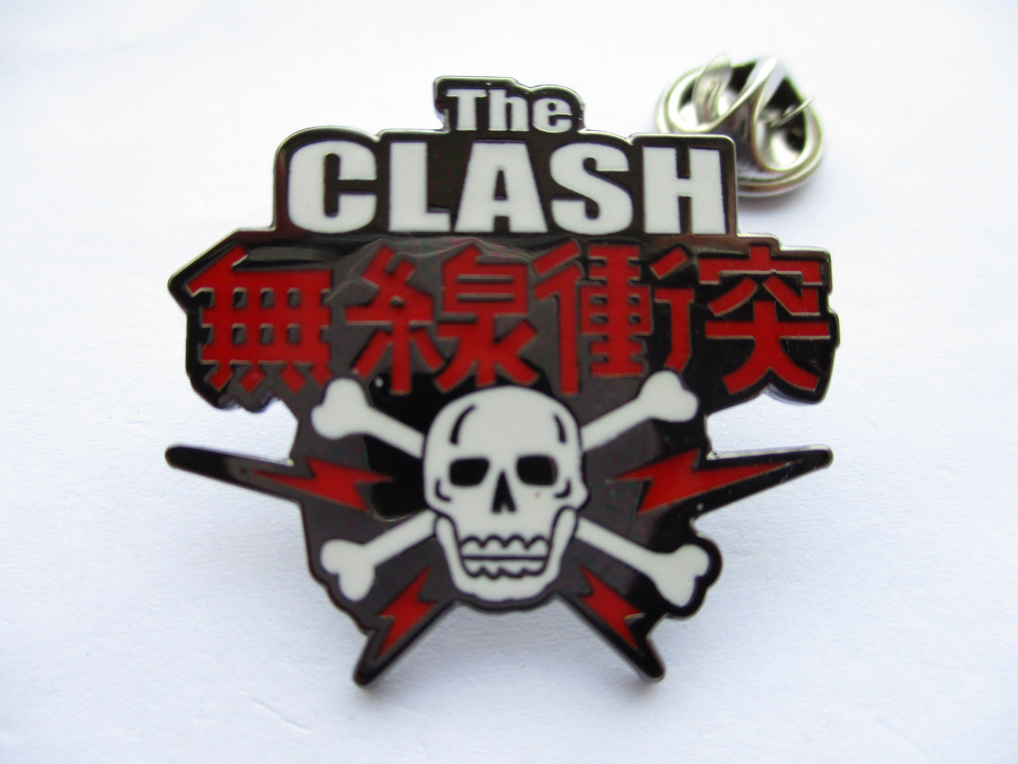 THE CLASH shaped oriental logo black PUNK METAL BADGE