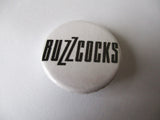 BUZZCOCKS punk badge (VARIOUS DESIGNS - 60p each)