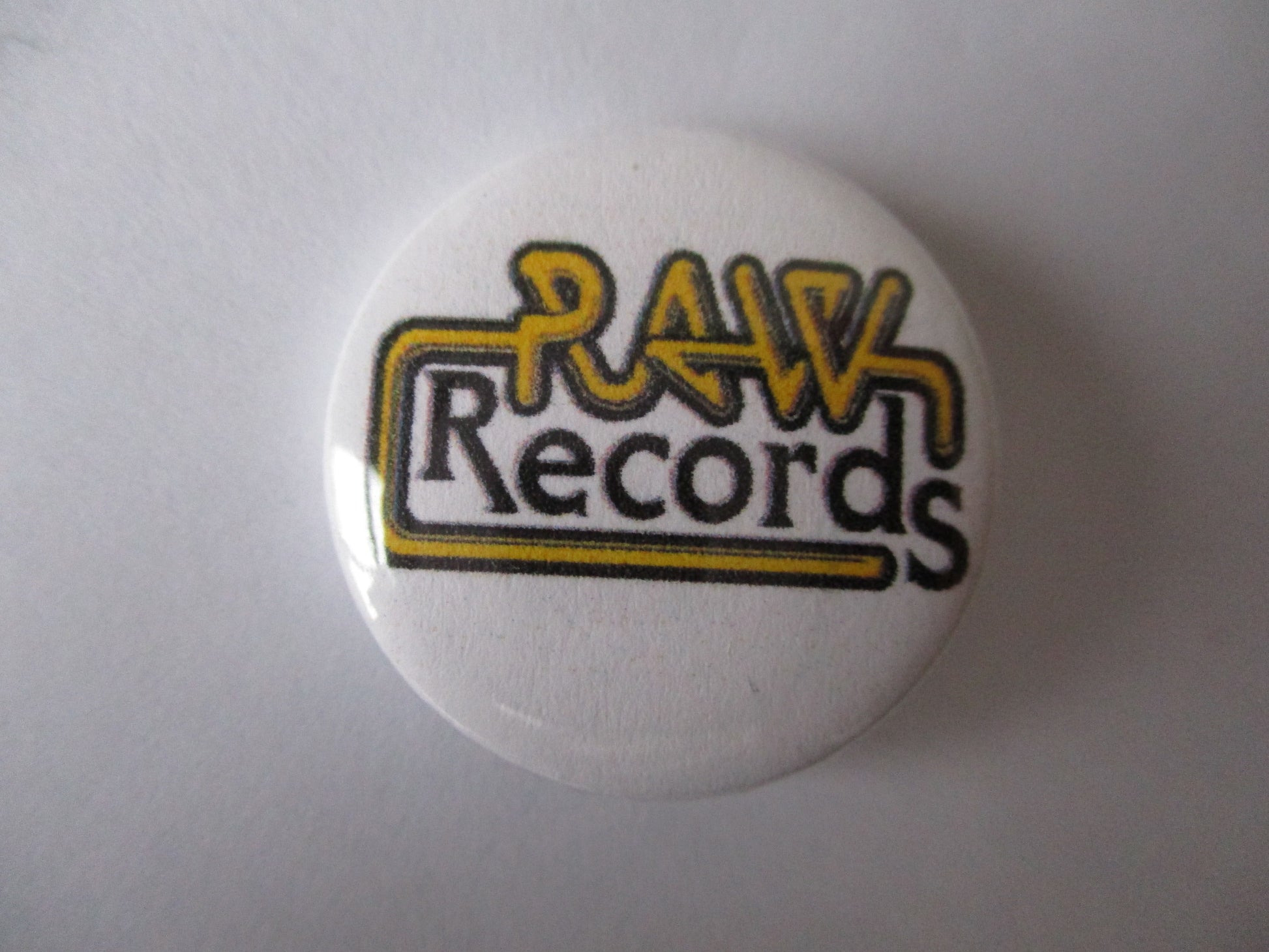 RAW RECORDS punk badge - Savage Amusement