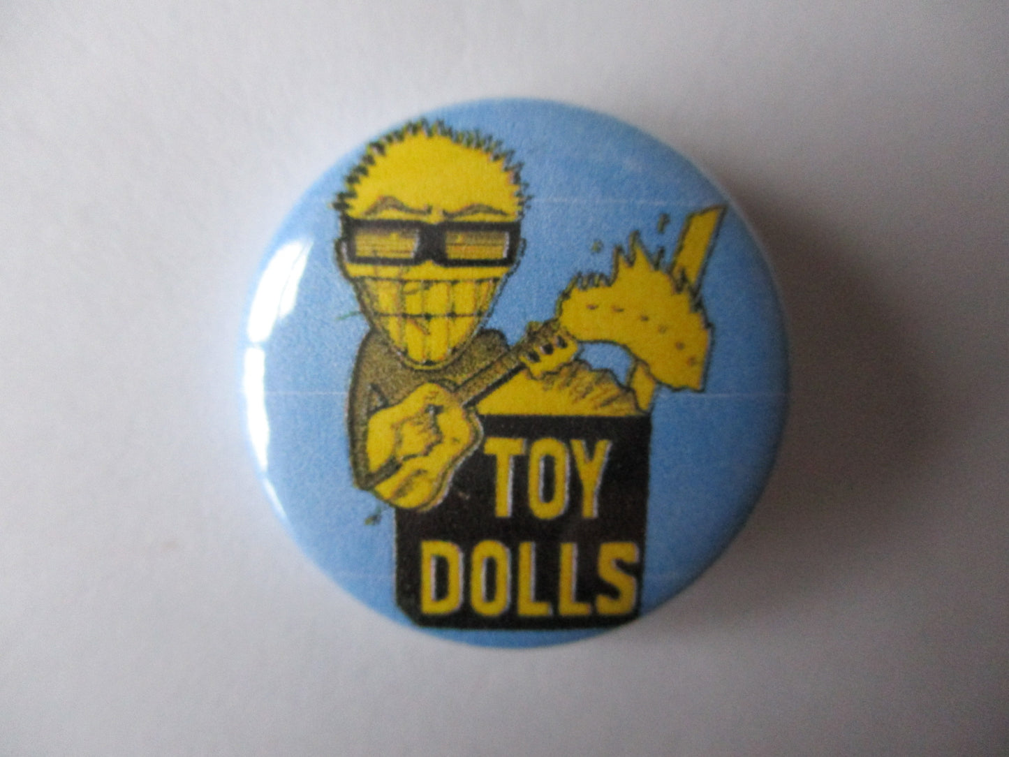TOY DOLLS punk badge (VARIOUS DESIGNS)