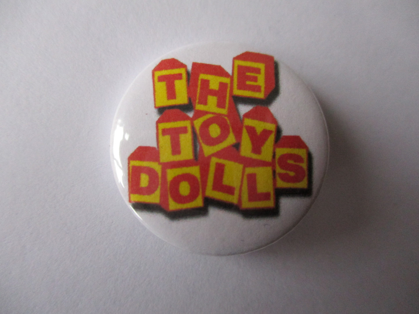 TOY DOLLS punk badge (VARIOUS DESIGNS)
