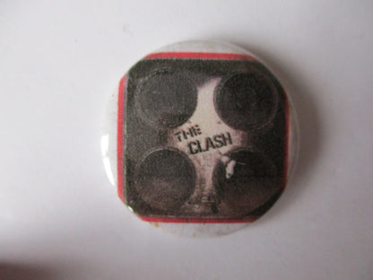 THE CLASH punk badge (VARIOUS OUT OF PRINT, discoloured)