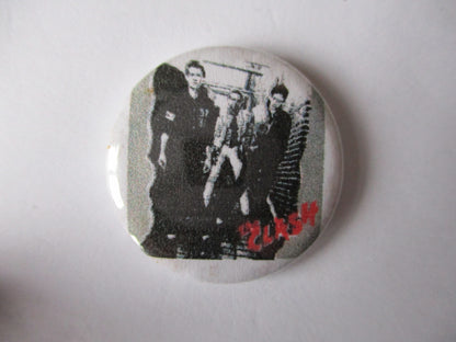 THE CLASH punk badge (VARIOUS OUT OF PRINT, discoloured)