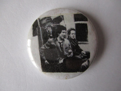 THE CLASH punk badge (VARIOUS OUT OF PRINT, discoloured)