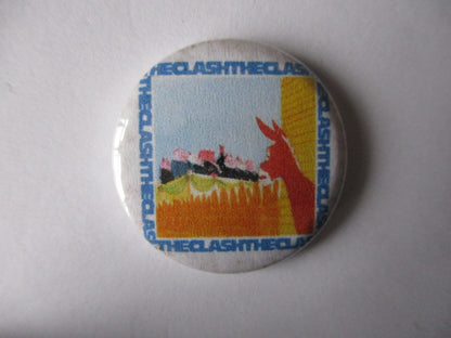 THE CLASH punk badge (VARIOUS OUT OF PRINT, discoloured)
