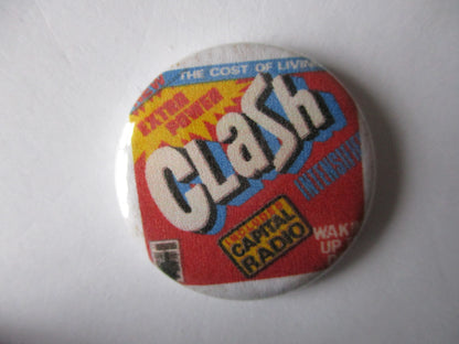 THE CLASH punk badge (VARIOUS OUT OF PRINT, discoloured)