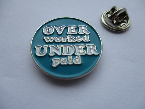 OVERWORKED & UNDERPAID METAL BADGE